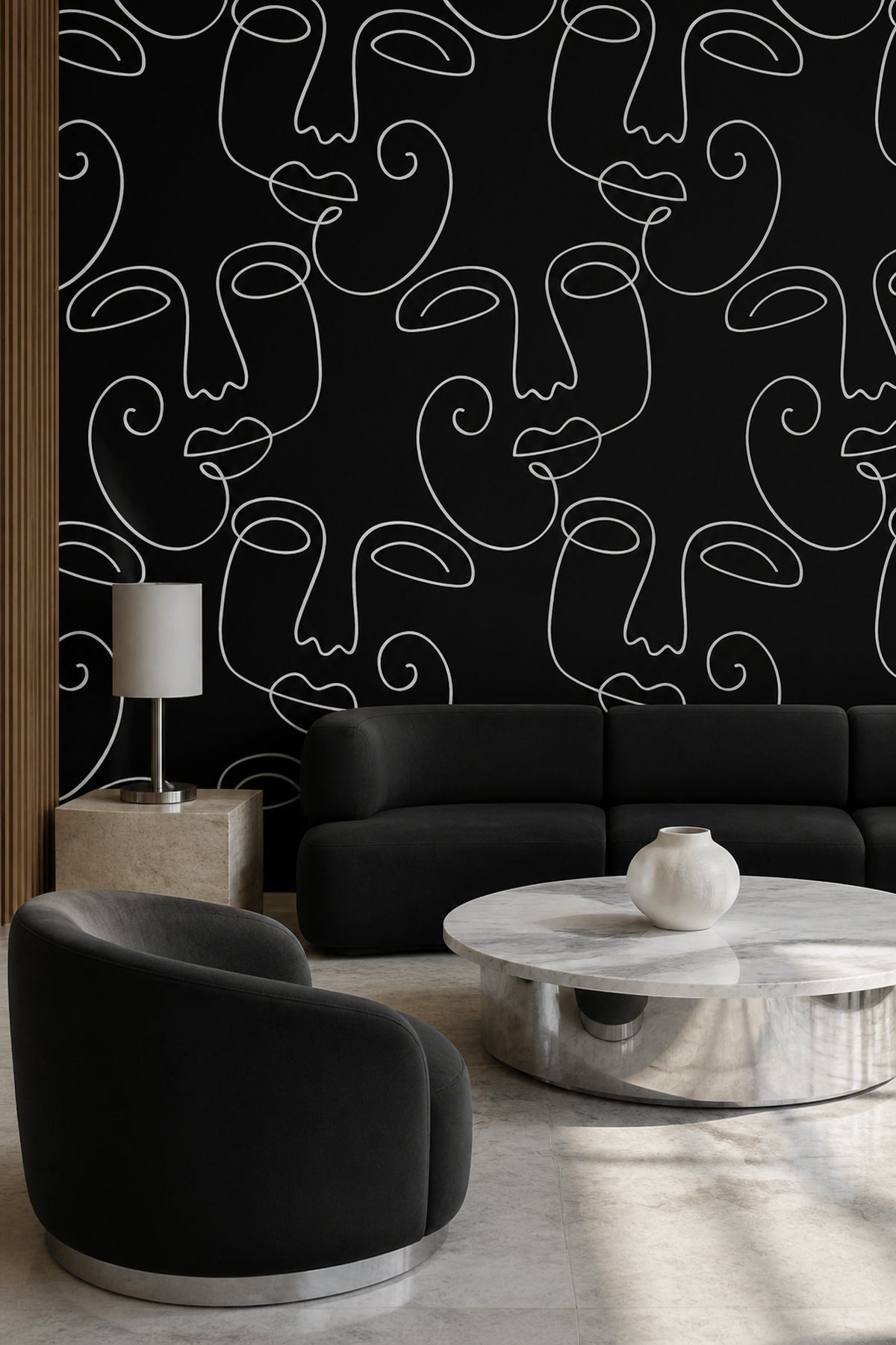 Black Abstract Faces 2 wall mural behind a black sofa
