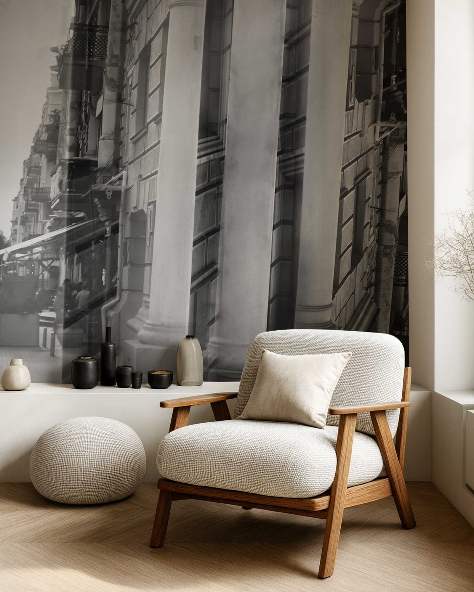 Parallaxis Wall Mural behind a modern armchair with wooden frame and white cushion.