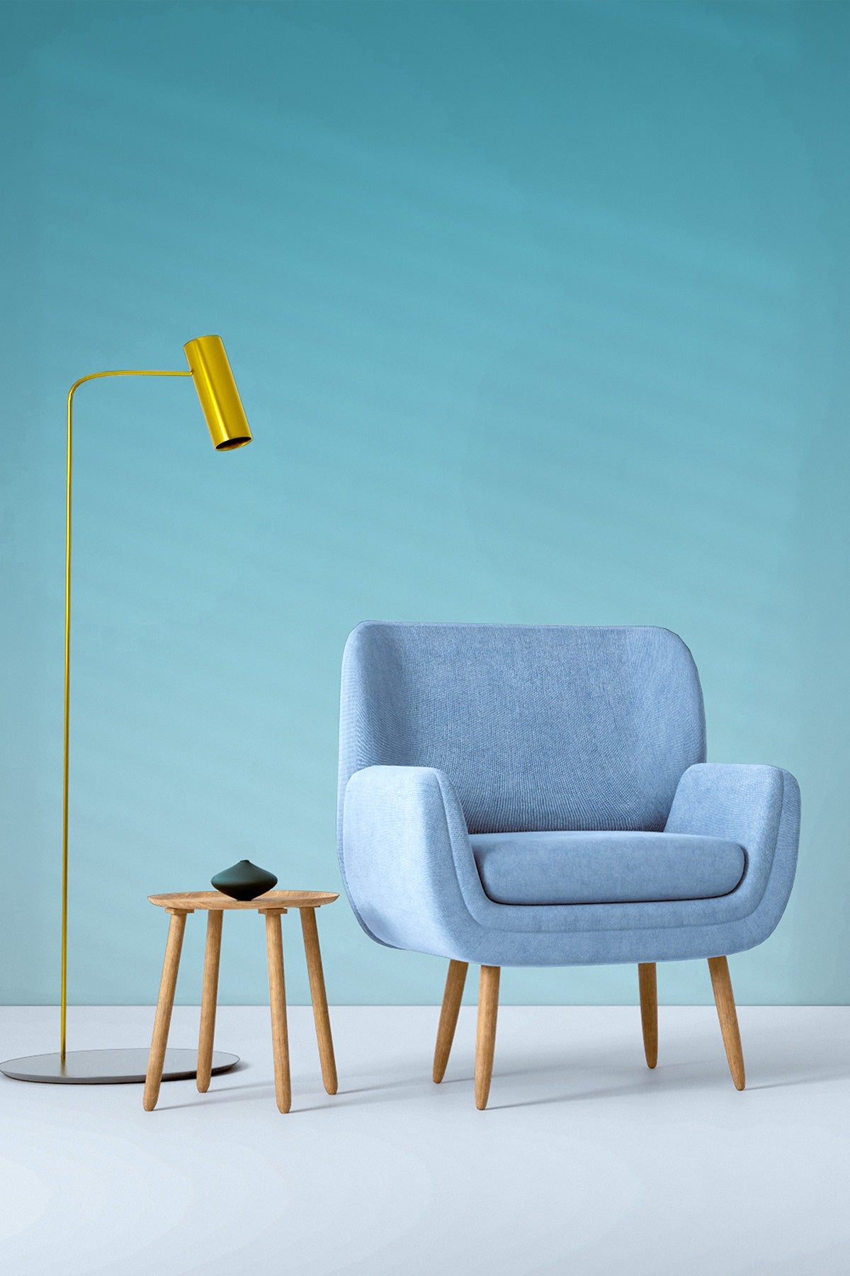 Turquoise Waters wallpaper behind an armchair