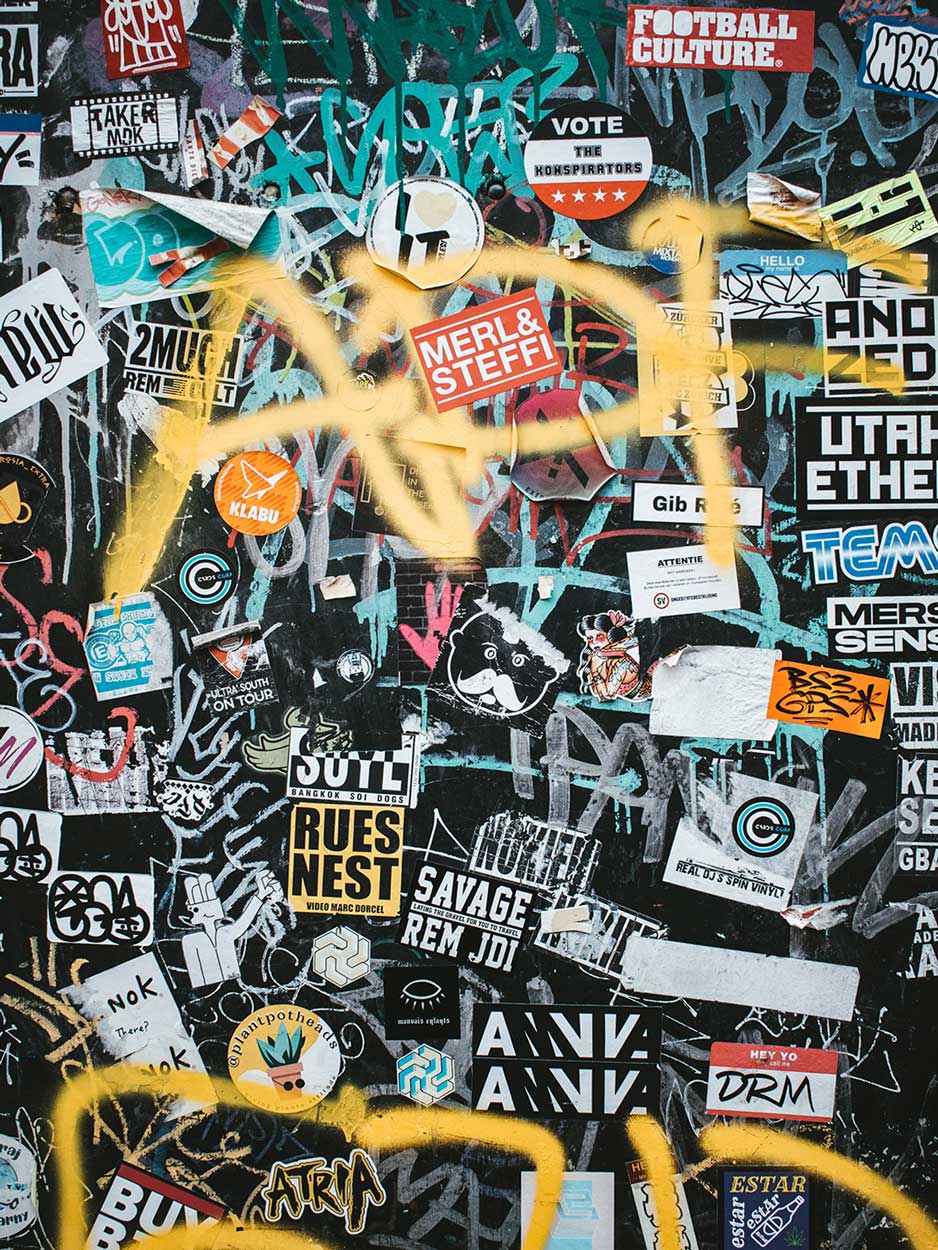 Grunge Graffiti over Stickers Wall Mural- Graffiti Wallpaper – Eazywallz