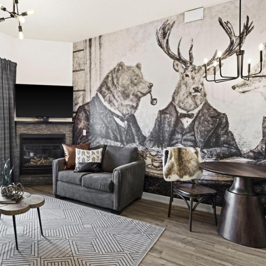 custom animal gentleman wall mural in a living room
