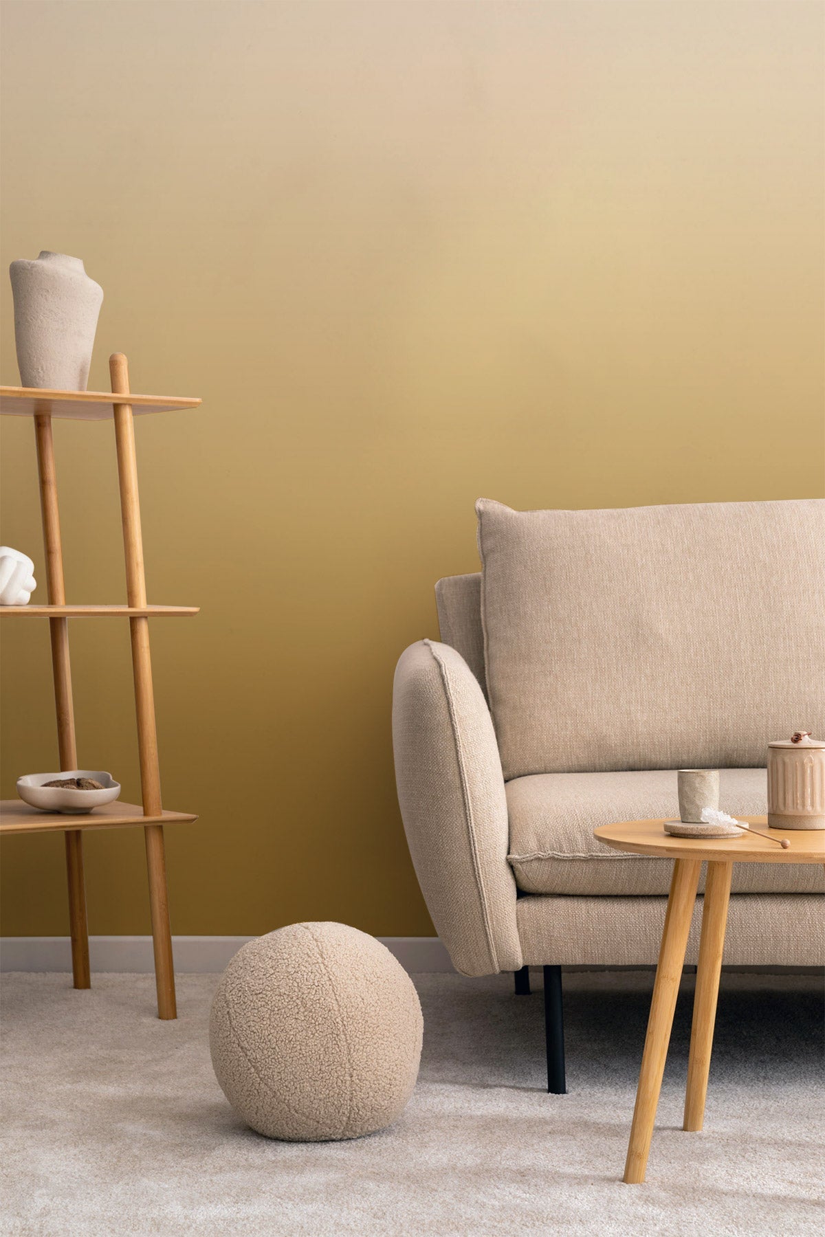 Gold Rush Wallpaper behind a sofa