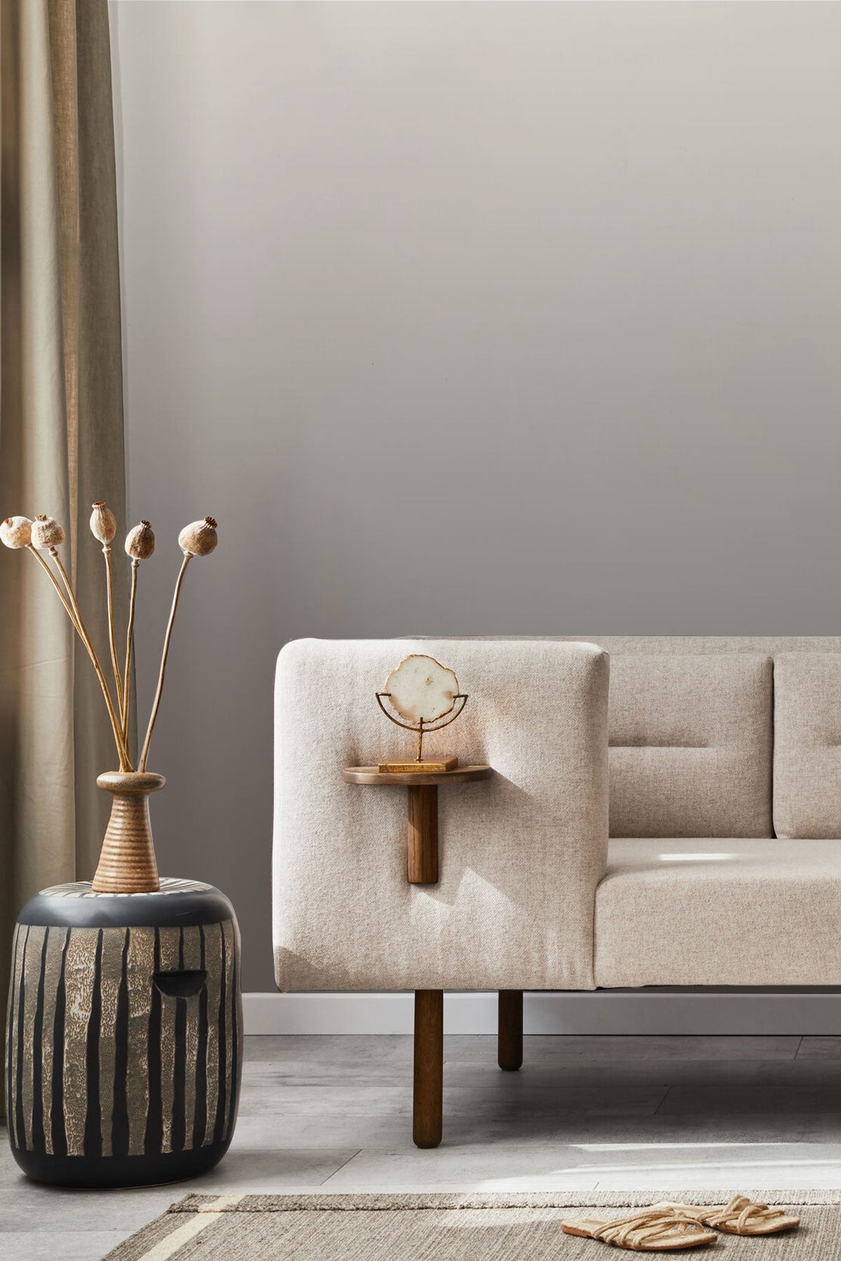 Sepia Symphony Wallpaper behind a sofa