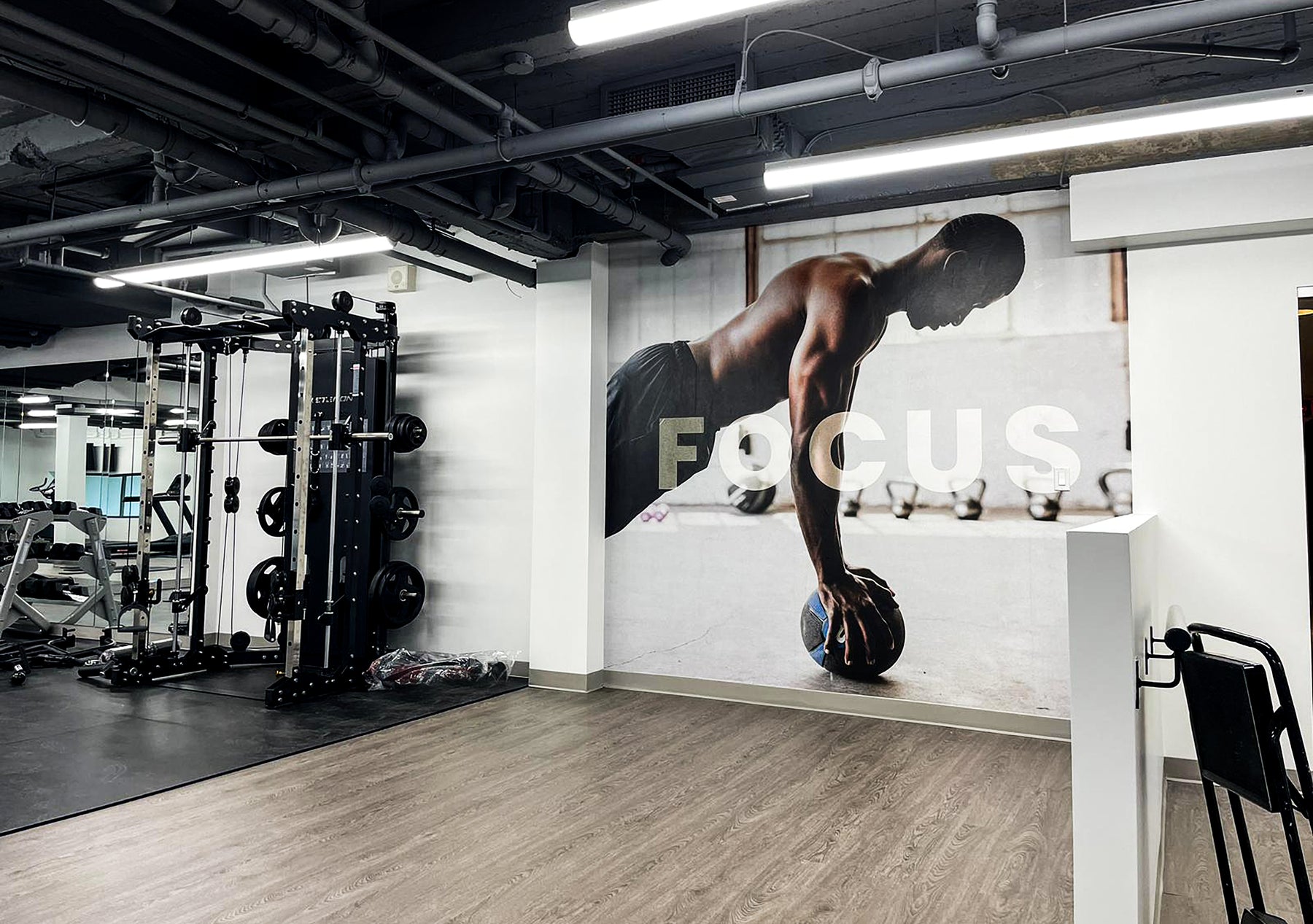 workout wall mural in a gym 
